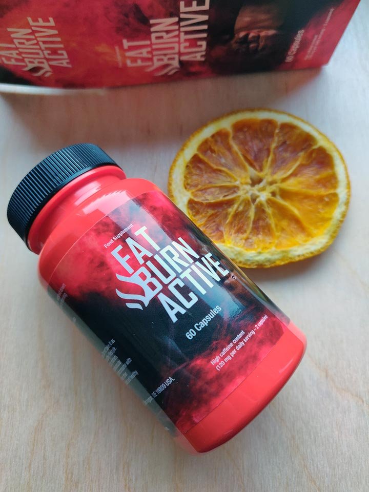 envase de suplemento con su caja de color negro y rojo con letras blancas.