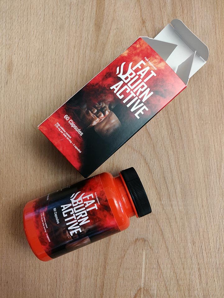 envase de suplemento con su caja de color negro y rojo con letras blancas.