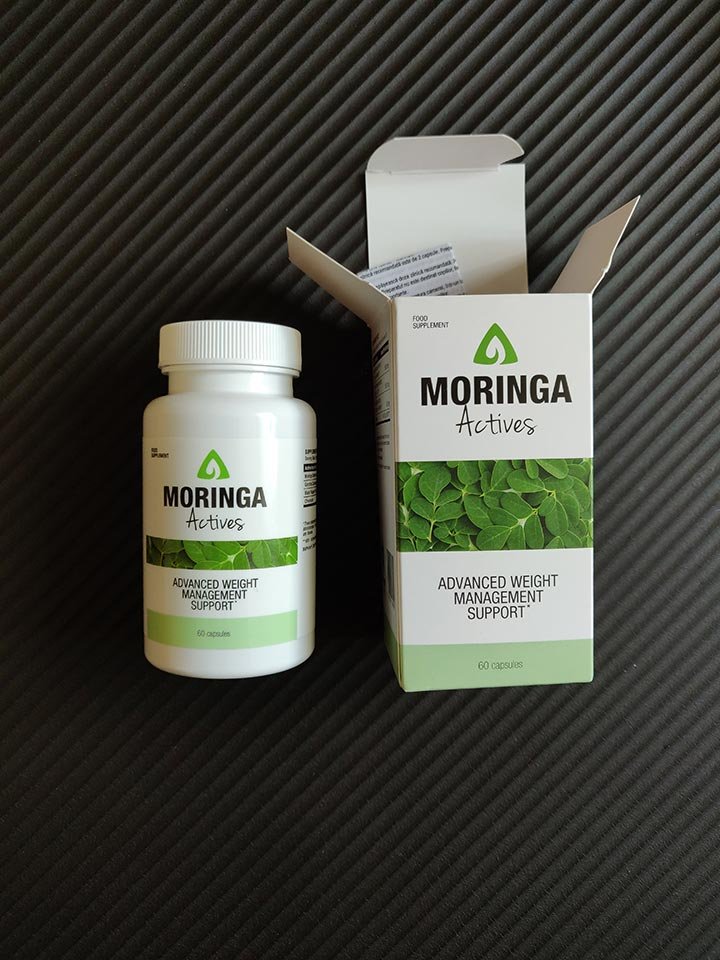 caja con envase blanca y verde con letras negras.