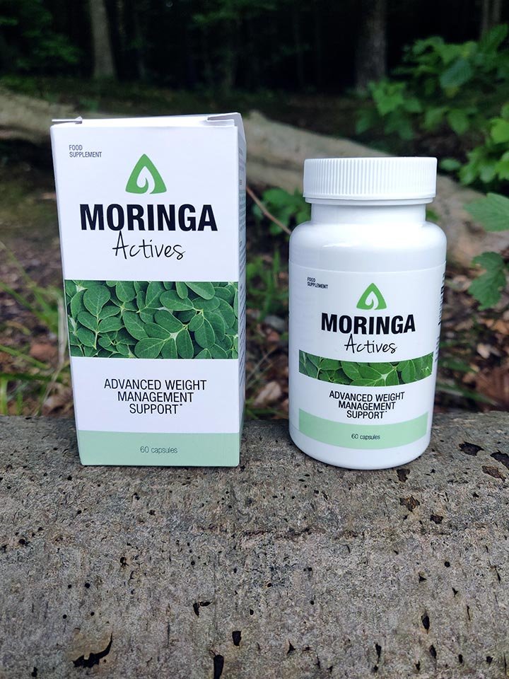 caja con envase blanca y verde con letras negras