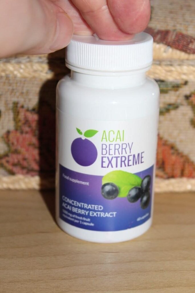 envase de suplemento sobre una superficie